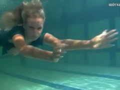 UhAnal presents: Big tits blonde girl swims in the nude