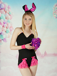 UhAnal presents: This tight blonde bunny has some smoking hot fun with stripping her clothes and playing with her flower