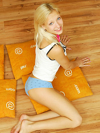 UhAnal presents: Amazing blonde nude teen decided to place herself at the attic of her wooden house on four orange pillows for her dirty intention.