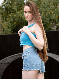 UhAnal presents: Beautiful Brunette Teen Hazel Shows Off Her Hairy Pussy and Masturbates Outdoors.