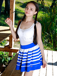 UhAnal presents: Fresh-Faced russian beauty Mia Grandy gets totally naked on a picnic table in a garden
